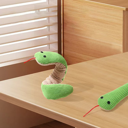 Green simulated snake cat toy, grinding teeth, chewing, interactive, boredom-relieving pillow
