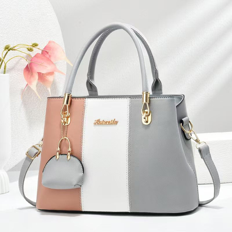 Women's fashionable, casual, versatile, large-capacity color-blocked bag; a great gift for mom or friends; shoulder/crossbody/handbag.