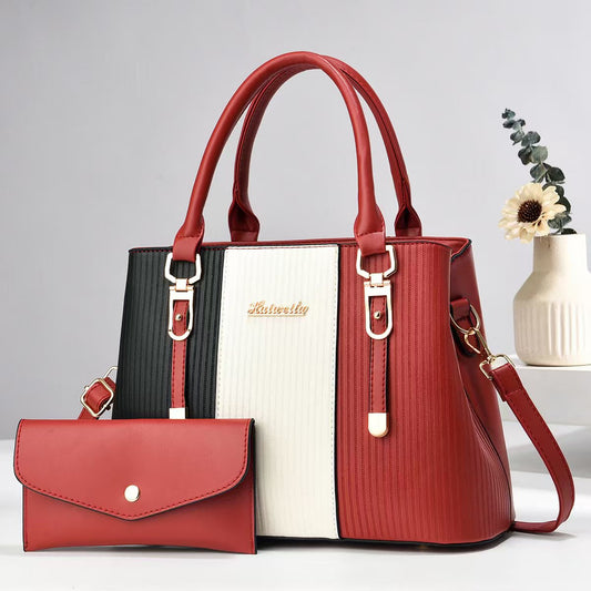 Color-blocked women's handbag, trendy and fashionable, made of PU material, suitable for shoulder or crossbody use, large capacity.